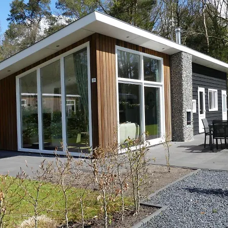 Modern Chalet With Outdoor Fireplace At The Forest Chalet